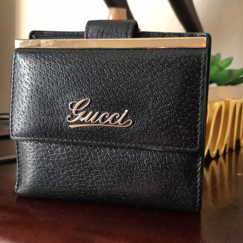 Flash Sale! Gucci bi-fold wallet with snap.